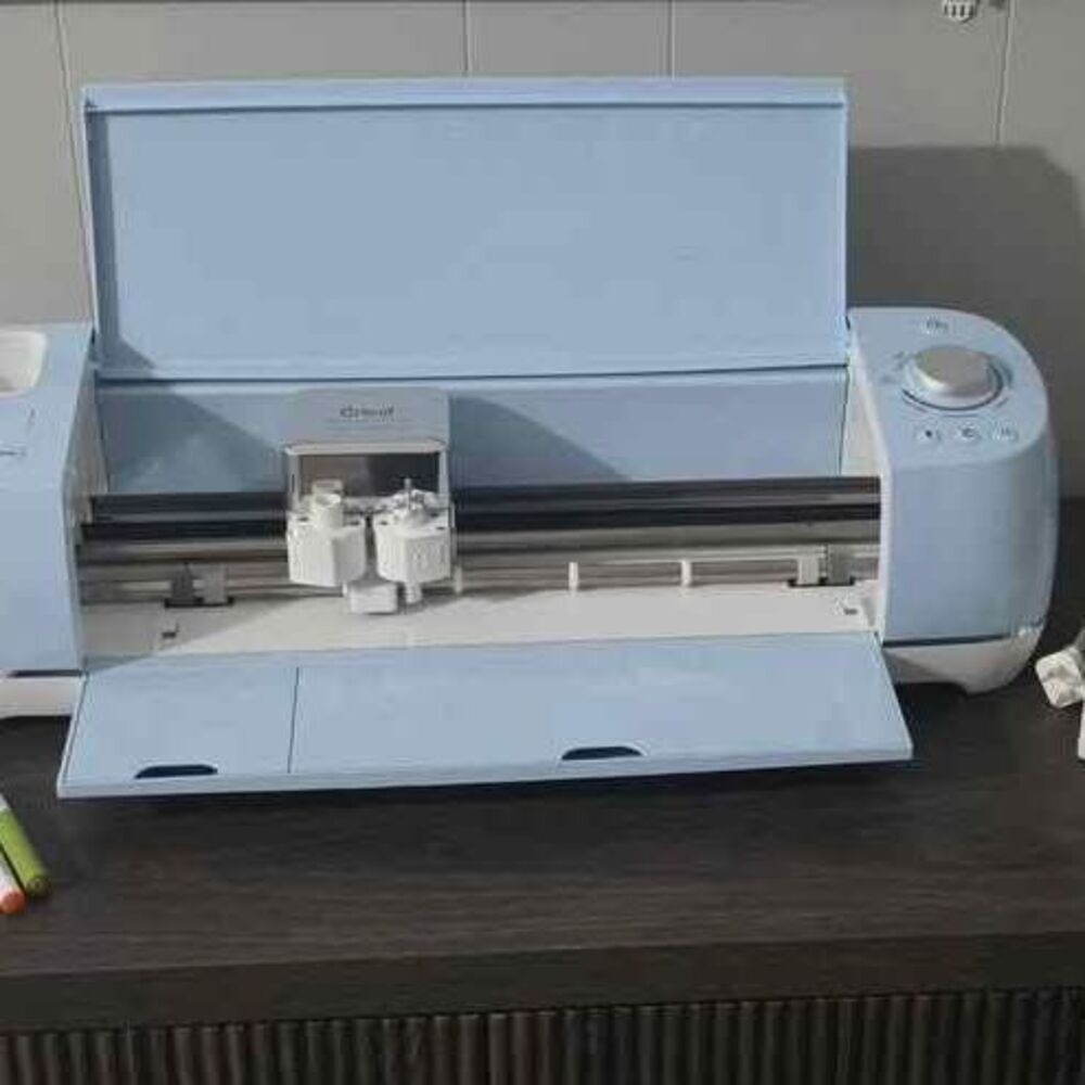Cricut Explorer Air 2 Cutting machine plus accessories.